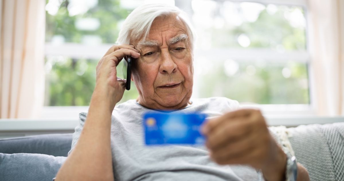 A senior man is susceptible to scams that ask for credit card information.