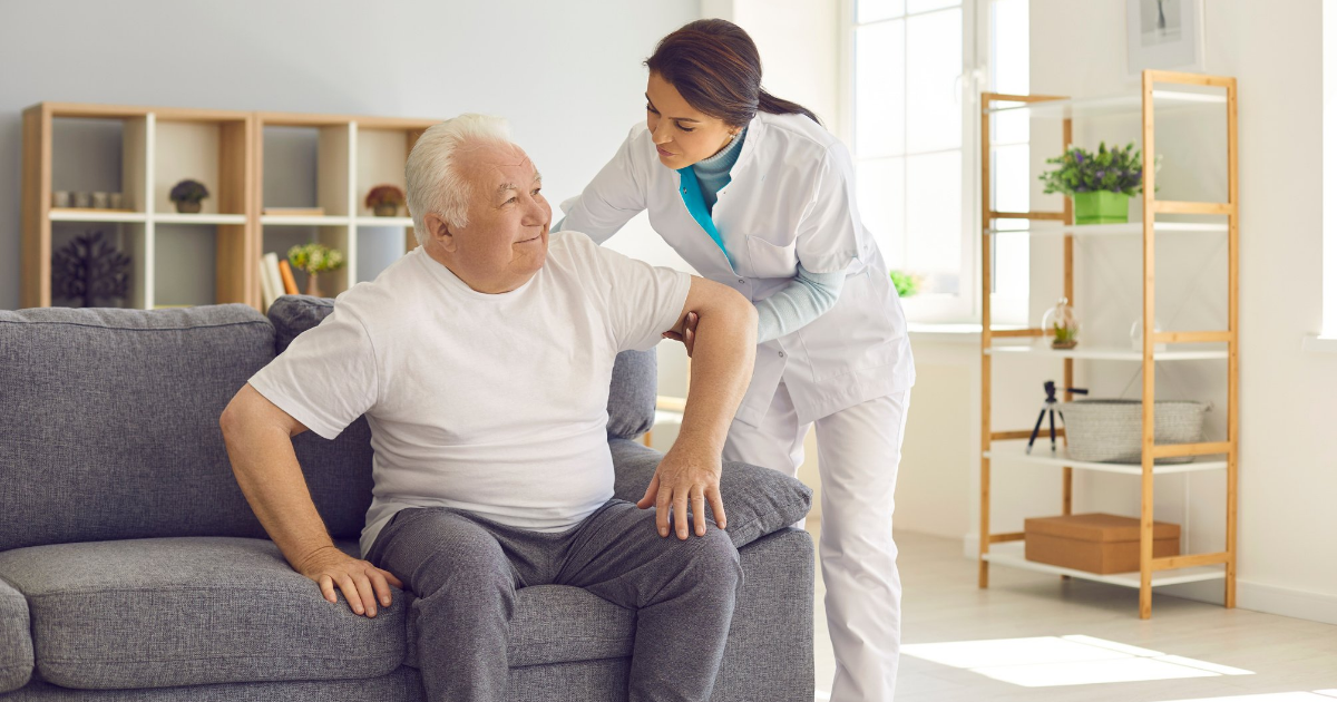 Lady-helping-elderly-assistance-at-home