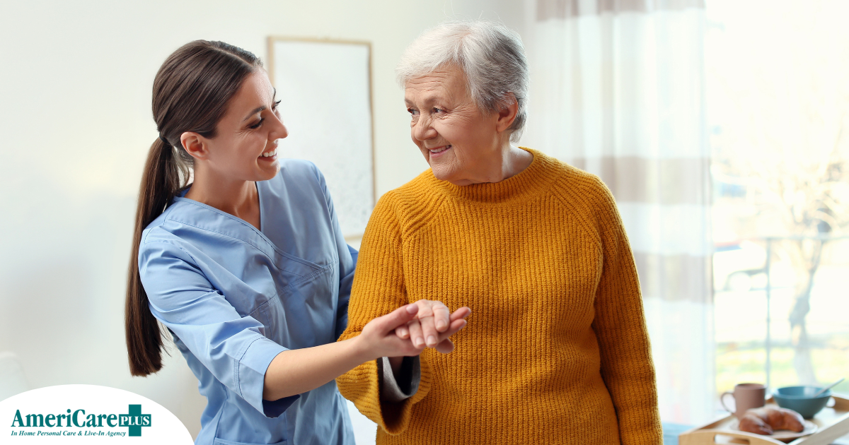 Professional caregivers, like this one who is helping a senior client walk, require a number of qualities and skills to provide compassionate personal care.