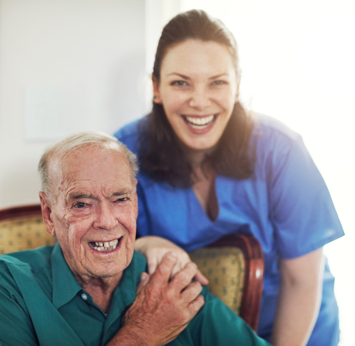 A caregiver and client smile, representing the quality of our 24 Hour Live-In Care in Lexington, VA