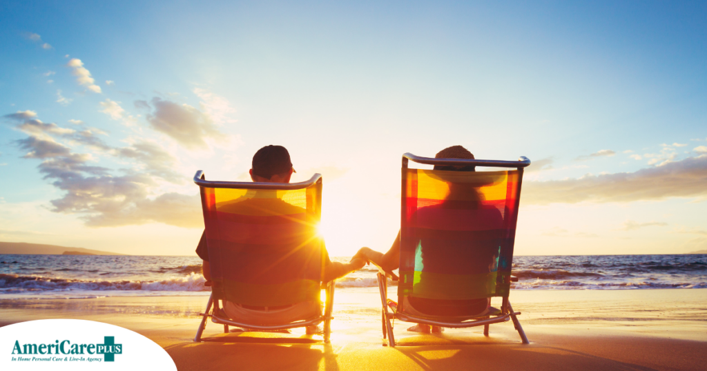 Caregiver travel hacks can help couples like this one on the beach enjoy their vacation.