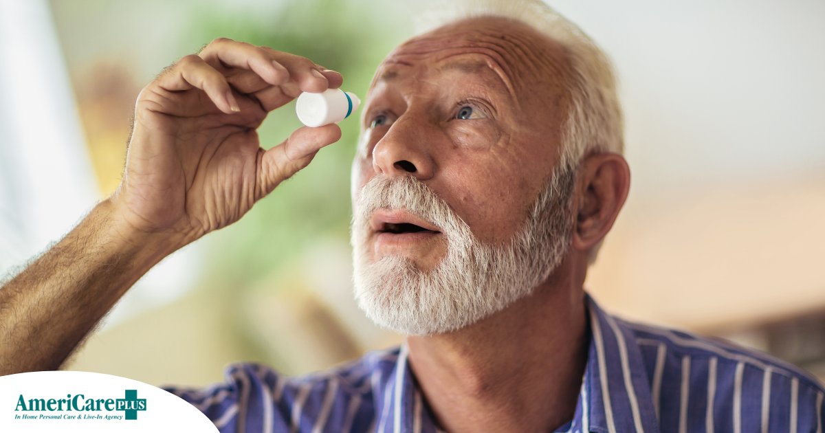 An older man uses eye drops as part of a good care routine to maintain his vision health.