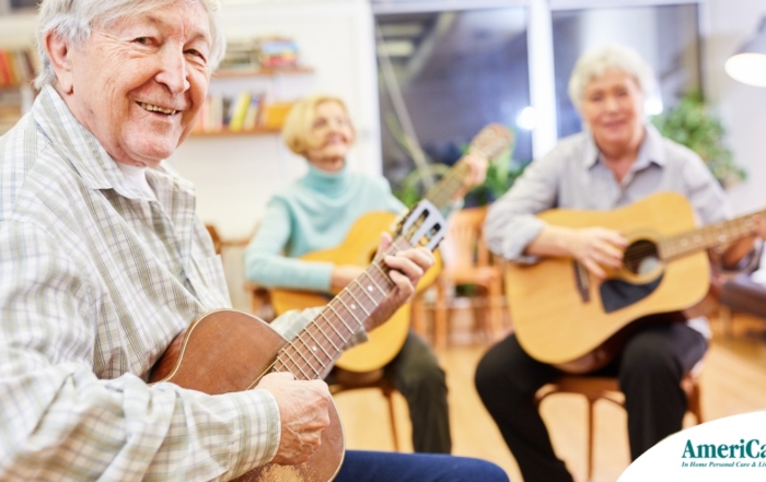 A group of seniors enjoy playing instruments together showing the impact of music for older adults.