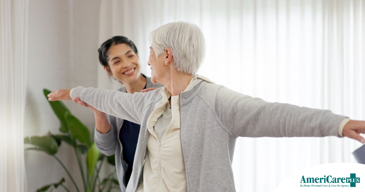 A caregiver and senior practice tai chi as one of many enriching activities for seniors at home.