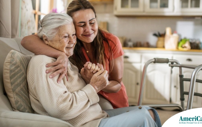 Caregiver supporting an elderly woman in the transition to senior home care