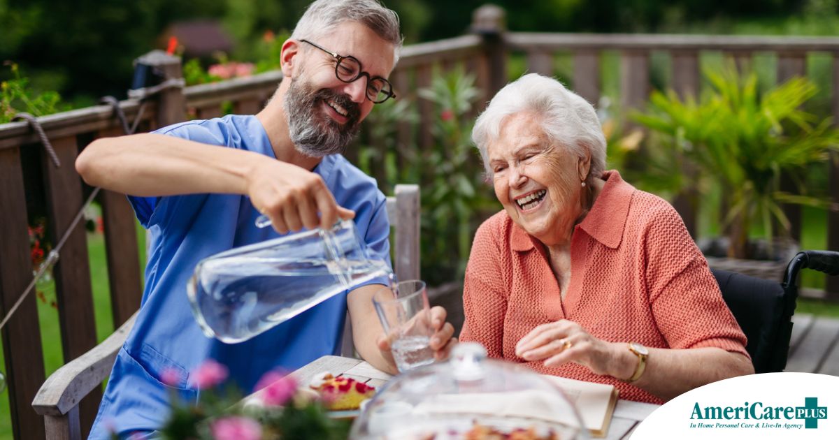 Summer Caregiving Tips for Keeping Clients Active in Warm Weather A caregiver applies summer Caregiving Tips including helping a senior stay hydrated.