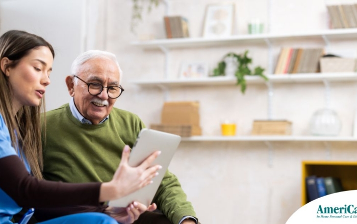 Home caregiver assisting senior man to use telehealth and senior care