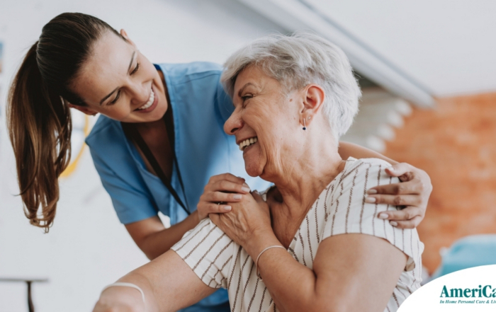 A female caregiver helping an older woman with stroke recovery at home.
